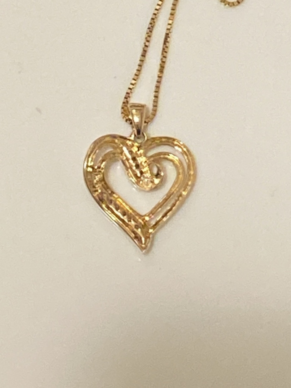 10K Solid Yellow Gold Diamond Ribbon Heart Pendant with Diamond Accents. - Picture 4 of 16